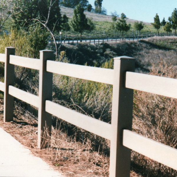 2-Rail fence along sidewalk in more rural setting